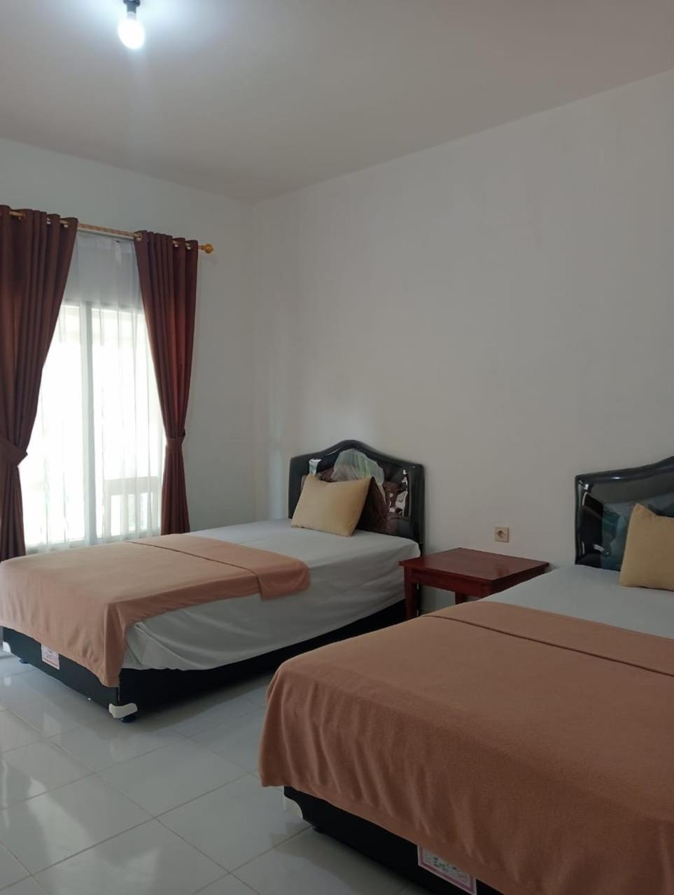 Tiu Kelep Homestay เซอนารู ภายนอก รูปภาพ